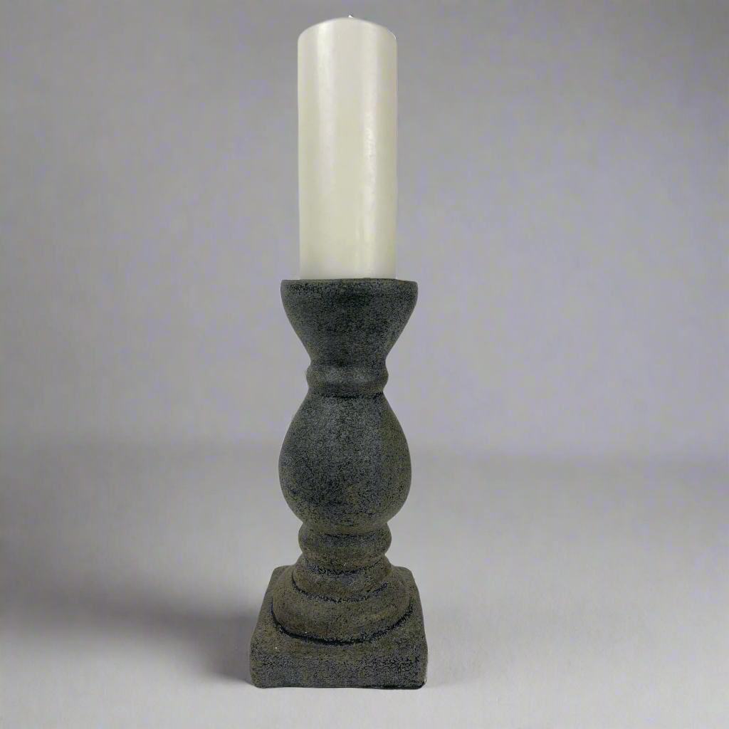 The chunky yet elegant Mattia Terracotta Candle Holder is substantial enough to work on its own or as a beautiful collection of candle holders on a mantelpiece or a table. Styled.