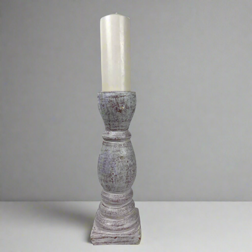 Crafted from terracotta, this chunky yet elegant Poppi Terracotta Candle Holder is substantial enough to work on its own or as a beautiful collection of candle holders on a mantelpiece or a table.