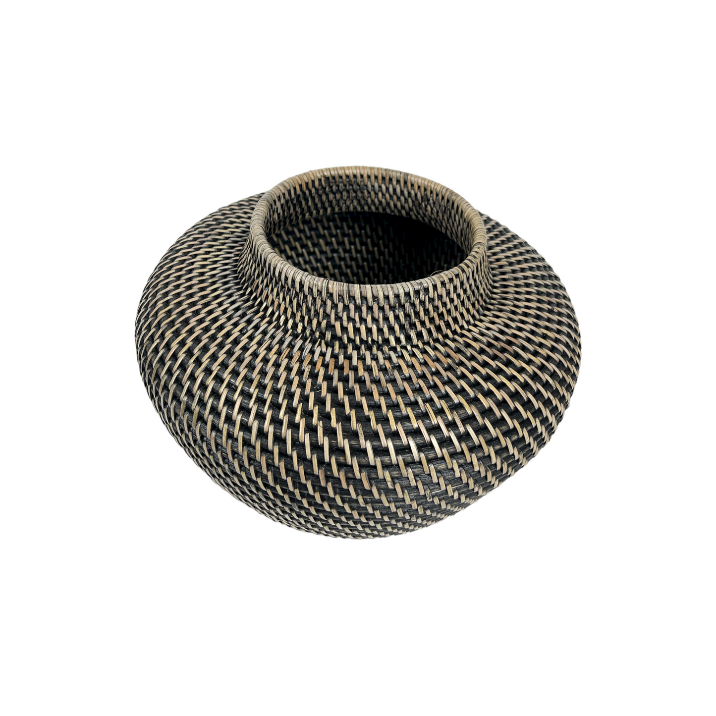 Let the Raja Rattan Vase enchant you with its stunning craftsmanship and tight weave that emanates a calming and natural vibe. This exquisite piece will bring character and coziness to your living space, and its adaptable design allows for beautiful floral arrangements or a simple, raw look. With a captivating blend of black and neutral tones, this vase is truly a must-have for any home. Top.