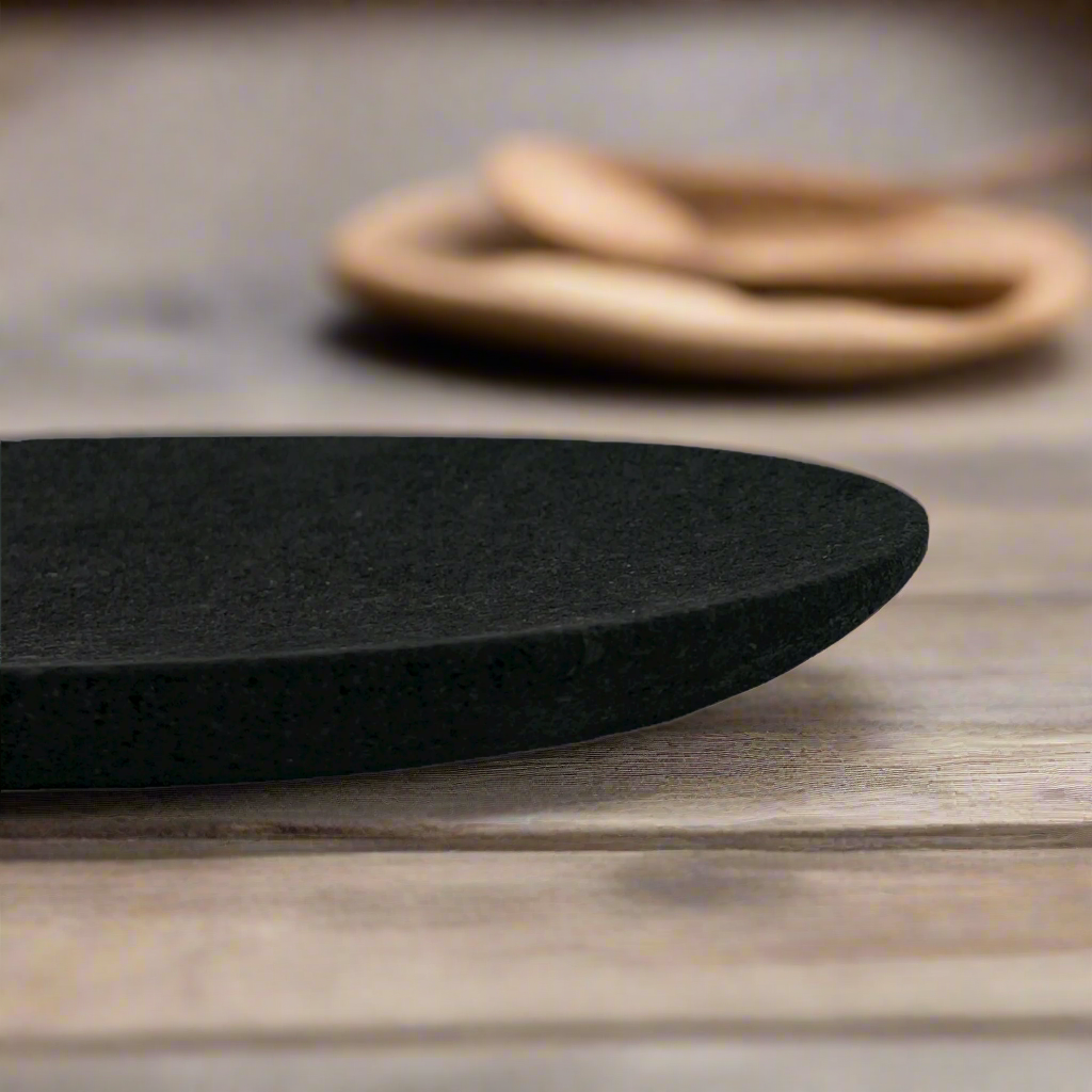 Crafted from volcanic lava stone, the Fabro Plate features a subtle curved design and is an incredibly versatile piece. Whether placed as a centrepiece on the dining table or used as a styling element in the living room, this shallow tray has a way of effortlessly highlighting its contents while providing a standalone sense of design.