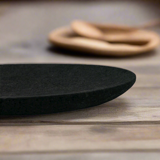 Crafted from volcanic lava stone, the Fabro Plate features a subtle curved design and is an incredibly versatile piece. Whether placed as a centrepiece on the dining table or used as a styling element in the living room, this shallow tray has a way of effortlessly highlighting its contents while providing a standalone sense of design.