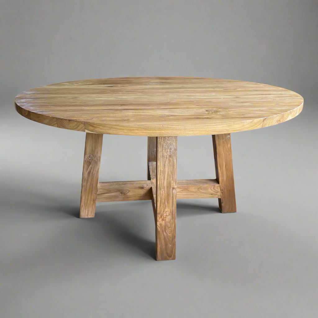 Constructed from solid teak, our Ardell Table offers both form and function to your dining space with its round shape. Suitable for indoor or outdoor use. Front