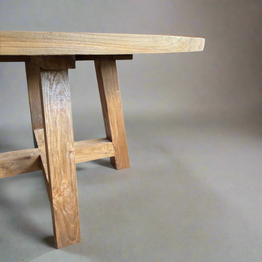 Constructed from solid teak, our Ardell Table offers both form and function to your dining space with its round shape. Suitable for indoor or outdoor use. Corner