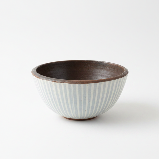 Artfully crafted, the unique Handcrafted Langit Batik & Terracotta Striped Blue Bowl lends just the right amount of texture and dimension to your table. Formed from terracotta, the warm reddish-brown terracotta hues and beautiful natural grains perfectly pair with the playful handcrafted blue Batik pattern.