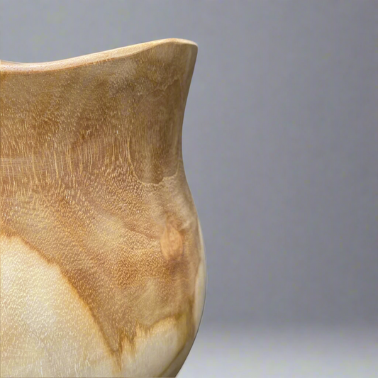 Lovingly hand-carved from solid teak, our Gunung Teak Bowl features the best of both organic and airy design. With a light hue and plenty of natural knots and grains, each bowl is unique.