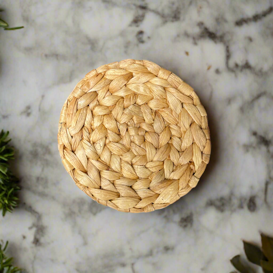 Our handwoven water hyacinth round coasters offer a stylish and elegant way to decorate and protect your table. Not only great for the dinner table, but our rattan coasters also work well on any surface you wish to protect around the house. Single.