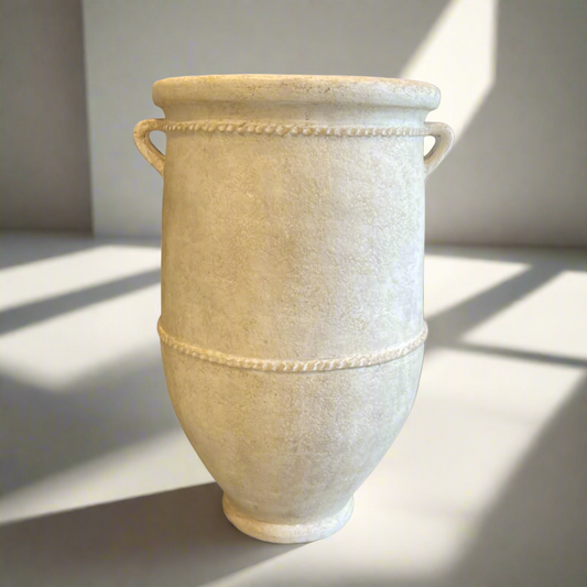 With a classic, traditional shape, this textured pot has a rustic whitewashed look giving this decorative piece character.