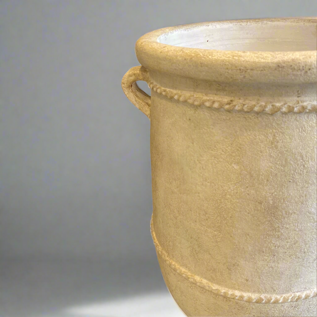 With a classic, traditional shape, this textured pot has a rustic whitewashed look giving this decorative piece character.