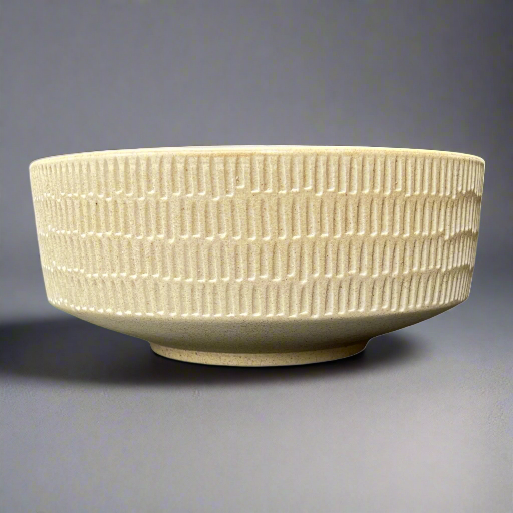 The Tembi Bowl boasts a simple yet contemporary shape and is perfect for adorning your everyday table scape with timeless style.