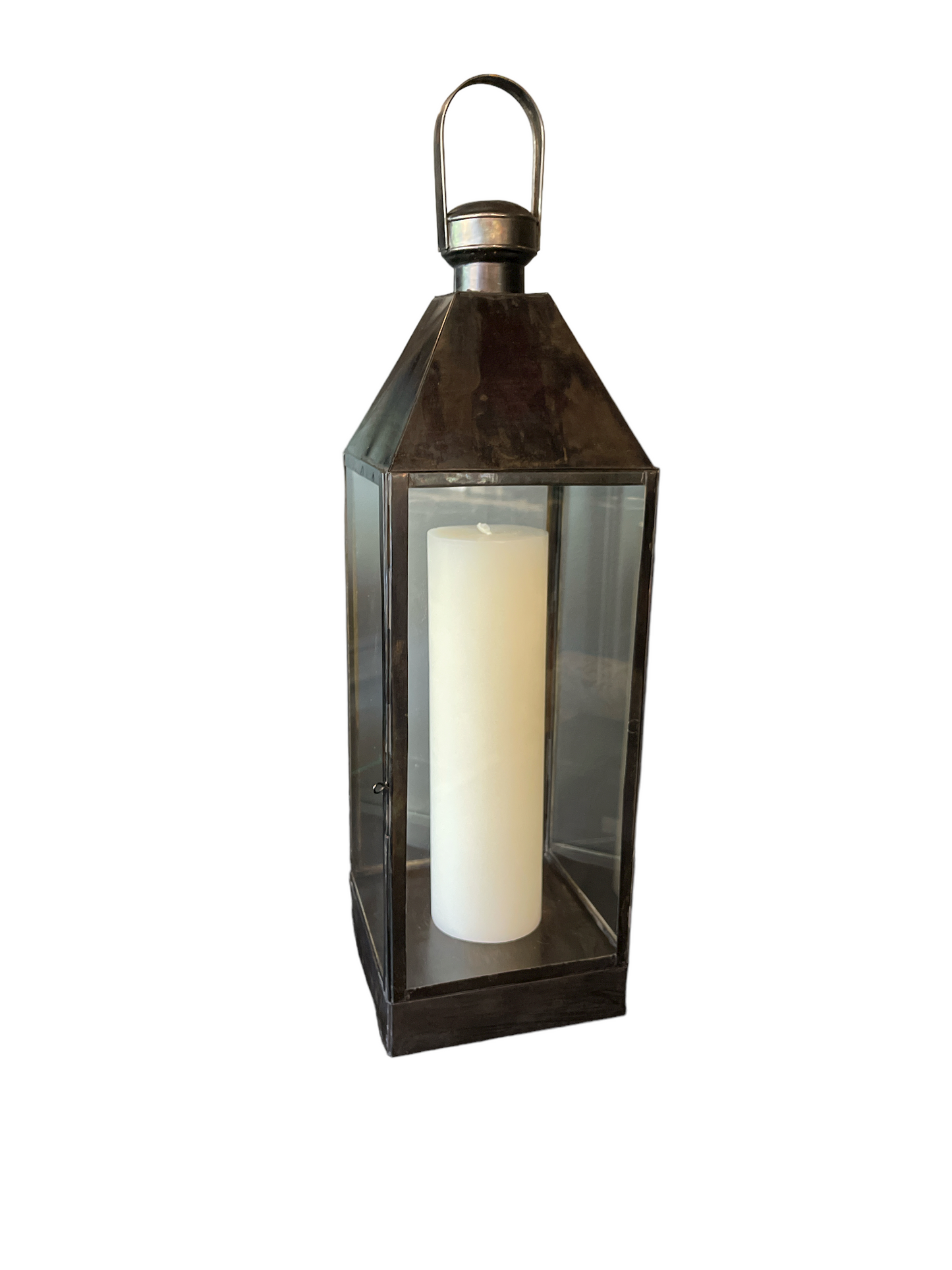 Stylishly decorate your living space with our stunning tall Singaraja Black Brass & Glass Lantern. The antique black brass metal finish perfectly complements the recycled glass panels and looks great styled with a candle.