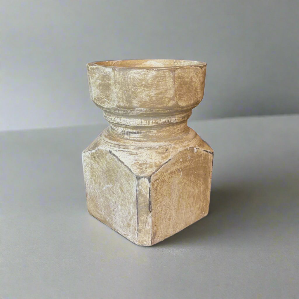 Experience the charm and practicality of the Handcarved Spello Teak Candle Holder, now with a beautiful delicate white wash detailing.