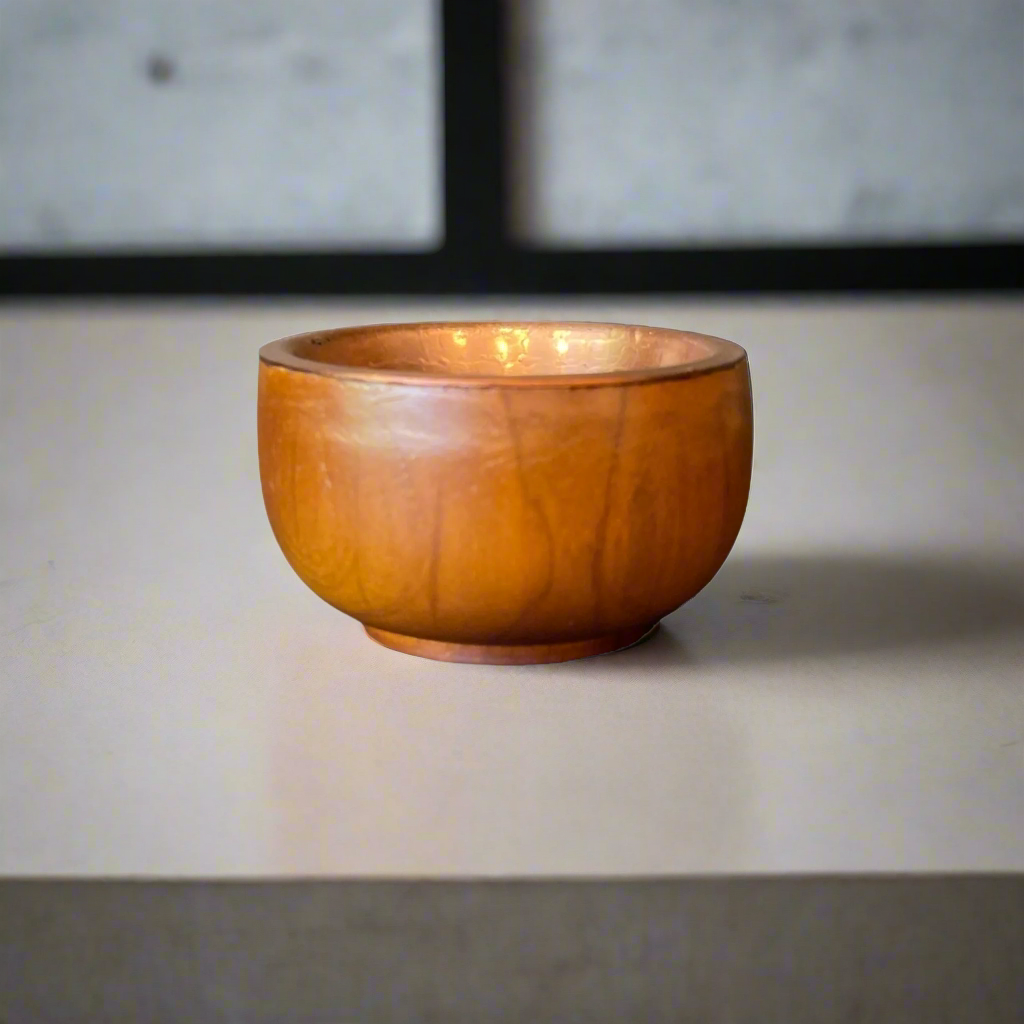 Capture attention with Ailan Teak Wood & Copper Bowls. The combination of teak and copper creates a stunning texture and dimension for any space. A remarkable decorative addition in any room.
