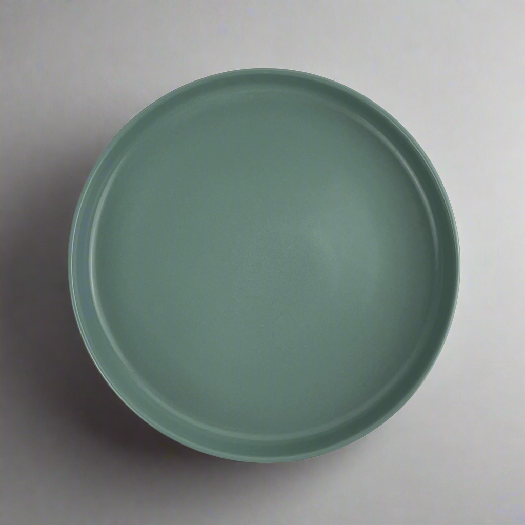 Indulge in the beauty of your salads and elevate your pasta experience with our medium depth, Handmade Kaya Blue Ceramic Bowl.