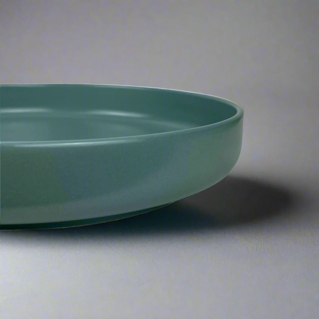 Indulge in the beauty of your salads and elevate your pasta experience with our medium depth, Handmade Kaya Blue Ceramic Bowl.