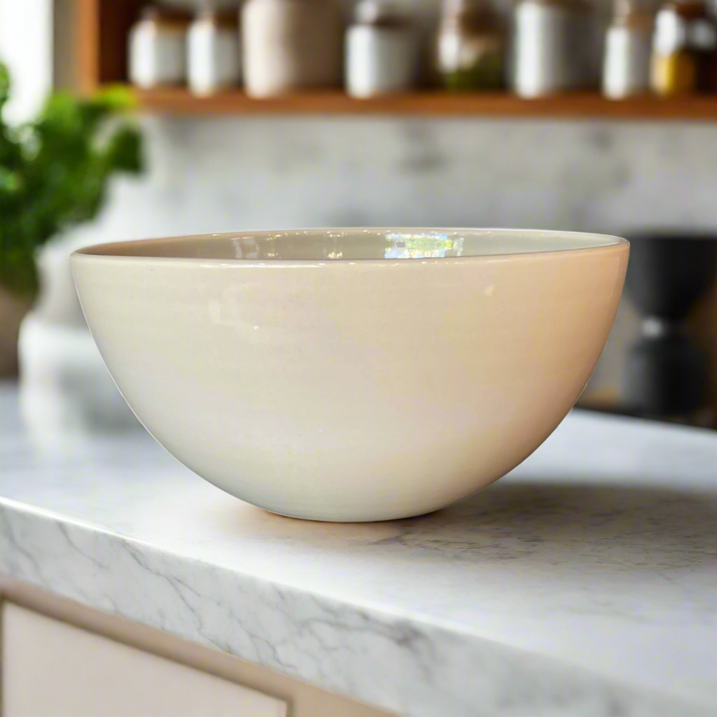 Lovingly handcrafted, this is an essential piece that brings a timeless component to any table or kitchen. Front