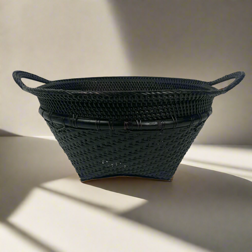 Crafted in remote East Indonesian Island Villages, the striking Basuki Handwoven Rattan & Bamboo Basket can be used as an accent piece or to provide additional useful storage.
