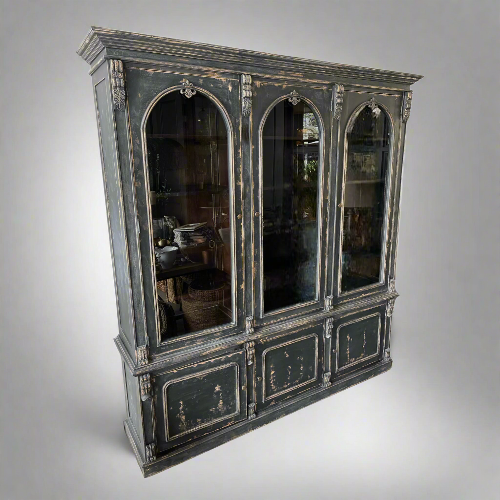 Our Aquitaine Display Cabinet showcase is a wonderful example of a popular traditional French design. This piece features 3 glass doors on top of 3 cupboards. Crafted from solid mahogany and hand finished with a light patina. Front