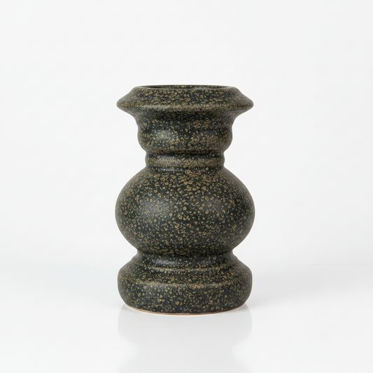 Crafted from terracotta, the chunky yet elegant Vienna Terracotta Candle Holder is substantial enough to work on their own or as a beautiful collection of candle holders on a mantelpiece or a table. Small.