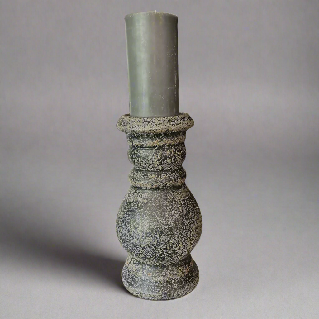 Crafted from terracotta, the chunky yet elegant Vergato Terracotta Candle Holder is substantial enough to work on its own or as a beautiful collection of candle holders on a mantelpiece or a table.