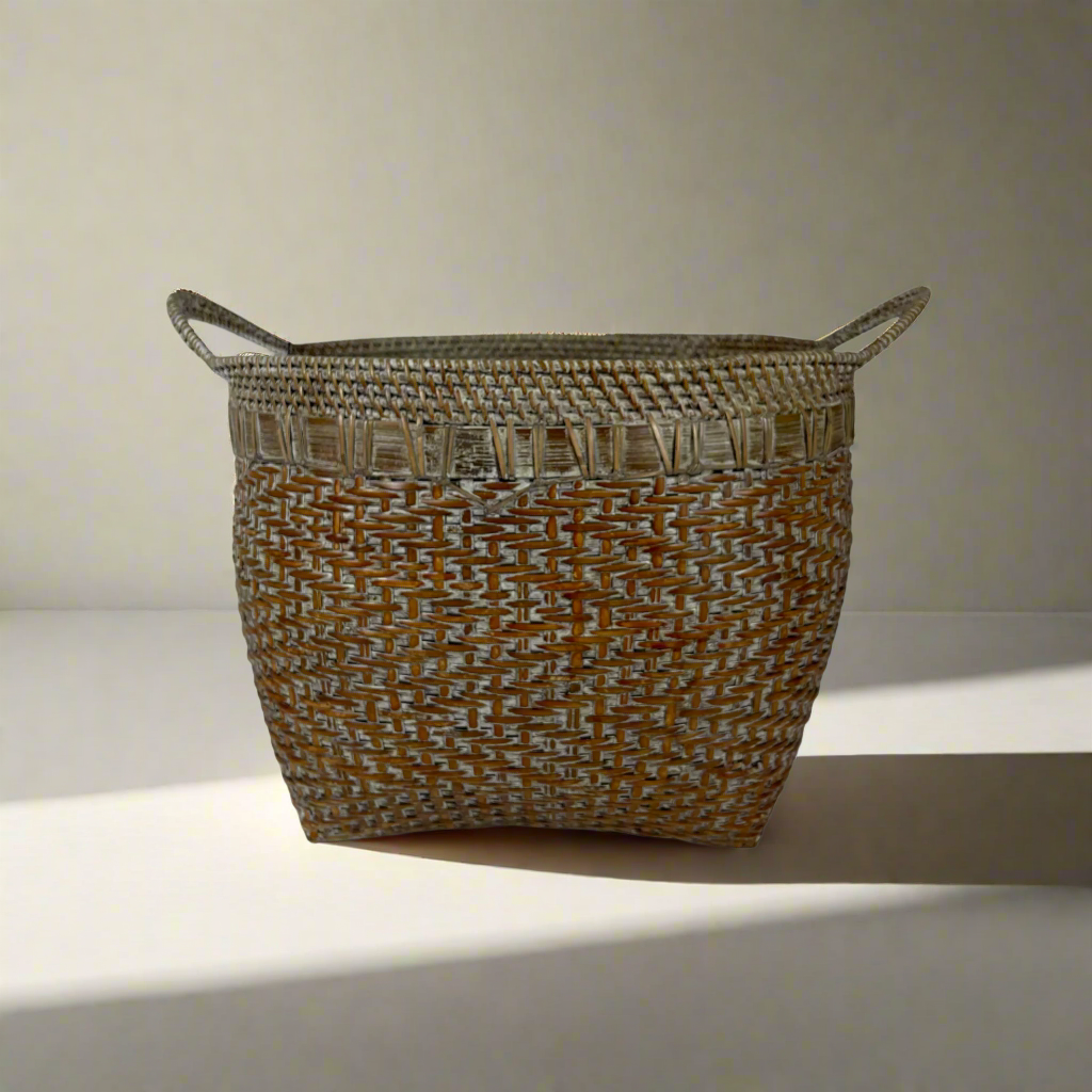 This traditional Ambon Handcrafted Whitewashed Basket hailing from a number of remote East Indonesian Island Villages, offers age-old charm, practical additional storage and stylish texture and warmth to your home. Front.