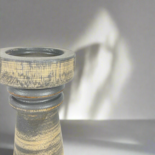 We love the chunky yet elegant Vignola Grey-washed Teak Candle Holder. Their soft curves and shapes accentuate the beauty of the natural recycled teak. They are substantial enough to work on their own or as a beautiful collection of candle holders on a mantelpiece or a table. Detail.