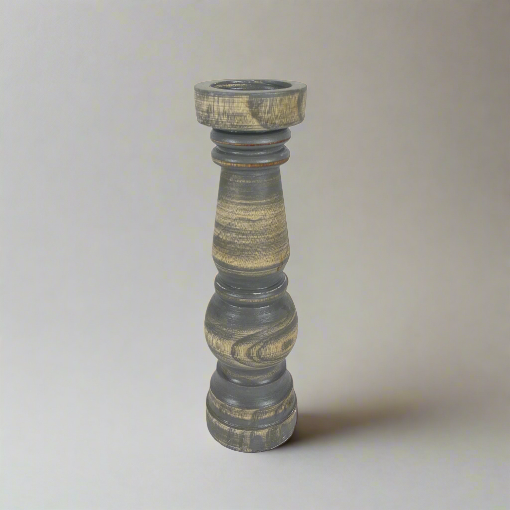 We love the chunky yet elegant Vignola Grey-washed Teak Candle Holder. Their soft curves and shapes accentuate the beauty of the natural recycled teak. They are substantial enough to work on their own or as a beautiful collection of candle holders on a mantelpiece or a table.