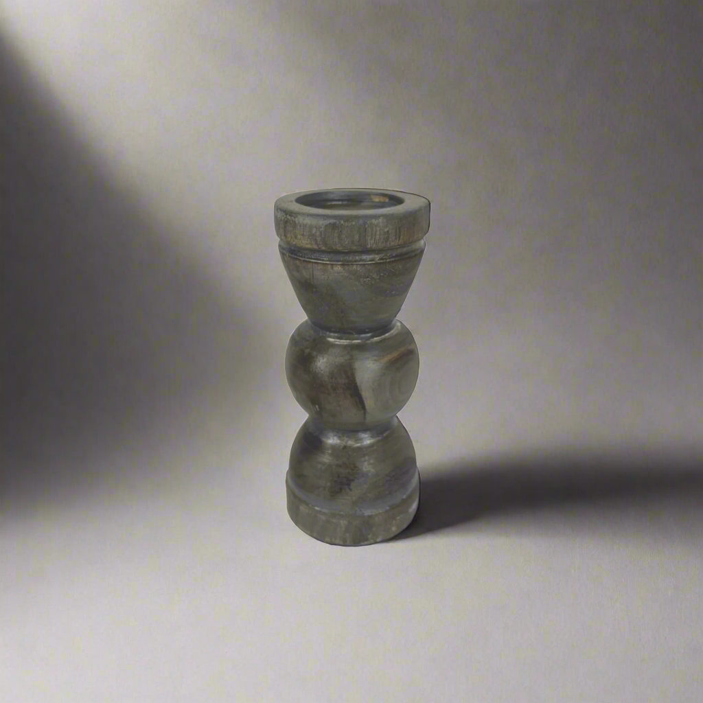 We love the chunky yet elegant Vignola Grey-washed Teak Candle Holder. Their soft curves and shapes accentuate the beauty of the natural recycled teak. They are substantial enough to work on their own or as a beautiful collection of candle holders on a mantelpiece or a table. Small.