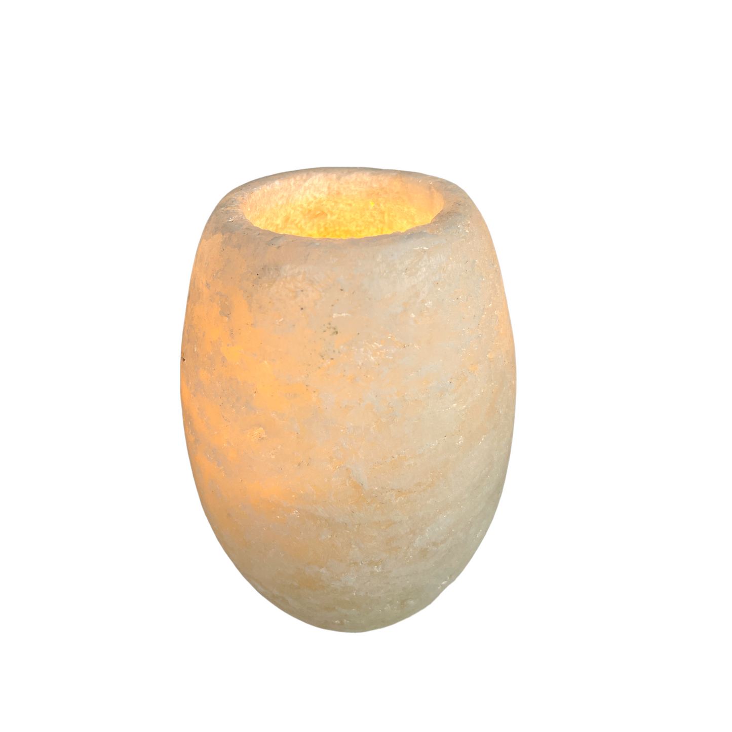 The Hand-carved Diah Onyx Candle Holder is a solid, stylish piece. Perfect as a candle holder to create softly diffused light and a soothing ambiance. Front.