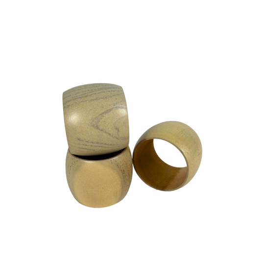 The neutral tone and smooth finish of these simple Wooden Napkin Rings adds a sophisticated softness to your table settings. Detail