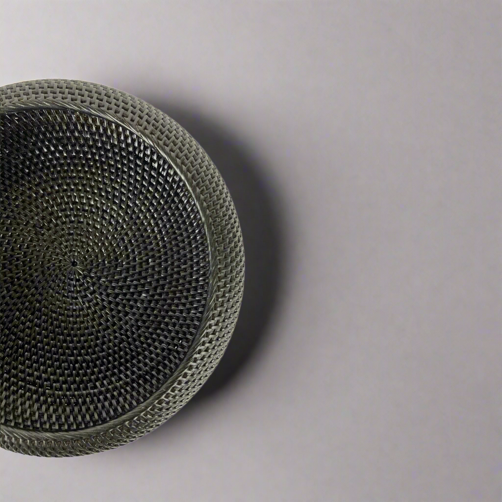 Get ready to elevate your home decor with our Bergaya Black Rattan Bowl. Carefully crafted with an artful touch, this stylish piece will add a beautiful texture to any room, instantly capturing attention and admiration. Top.