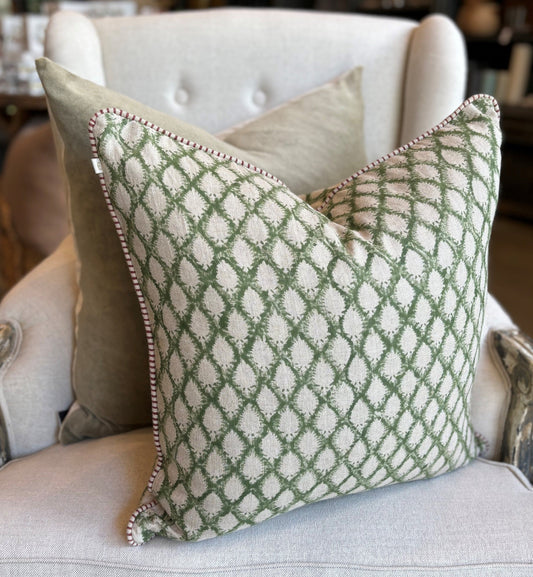 Elevate your home decor with the Cypress Block Printed Linen Green Cushion from CHAMOIS, a beloved Swedish brand known for their impeccable style. Crafted from premium Belgian 100% linen and featuring a soft feather insert, this cushion is a must-have for those who appreciate luxurious and high-quality design.