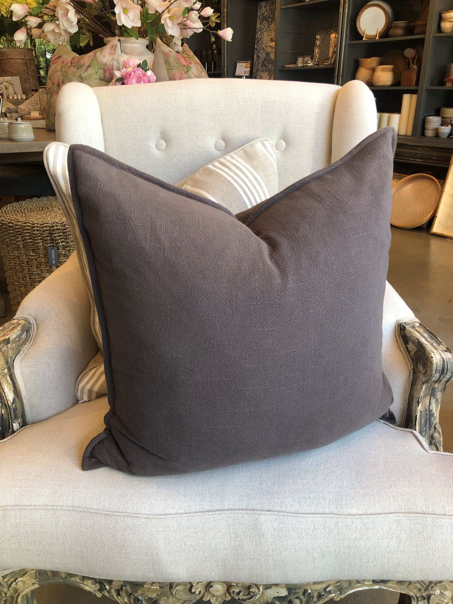 The plush feather-filled Oban Herringbone Woven Stonewashed French Linen Cushion showcases a classic charcoal coloured pattern woven from French Linen which has been stonewashed to achieve a soft luxurious feel.