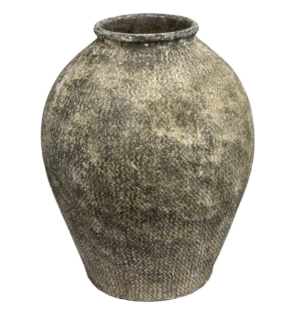 The Clara Natural Planter Large features a unique etched zigzag pattern that brings a sense of style to any room. Its classic urn shape, combined with its vintage-inspired design and distressed, weathered look, exudes the rustic charm of past times, making it a must-have cement pot for both indoor and outdoor spaces.