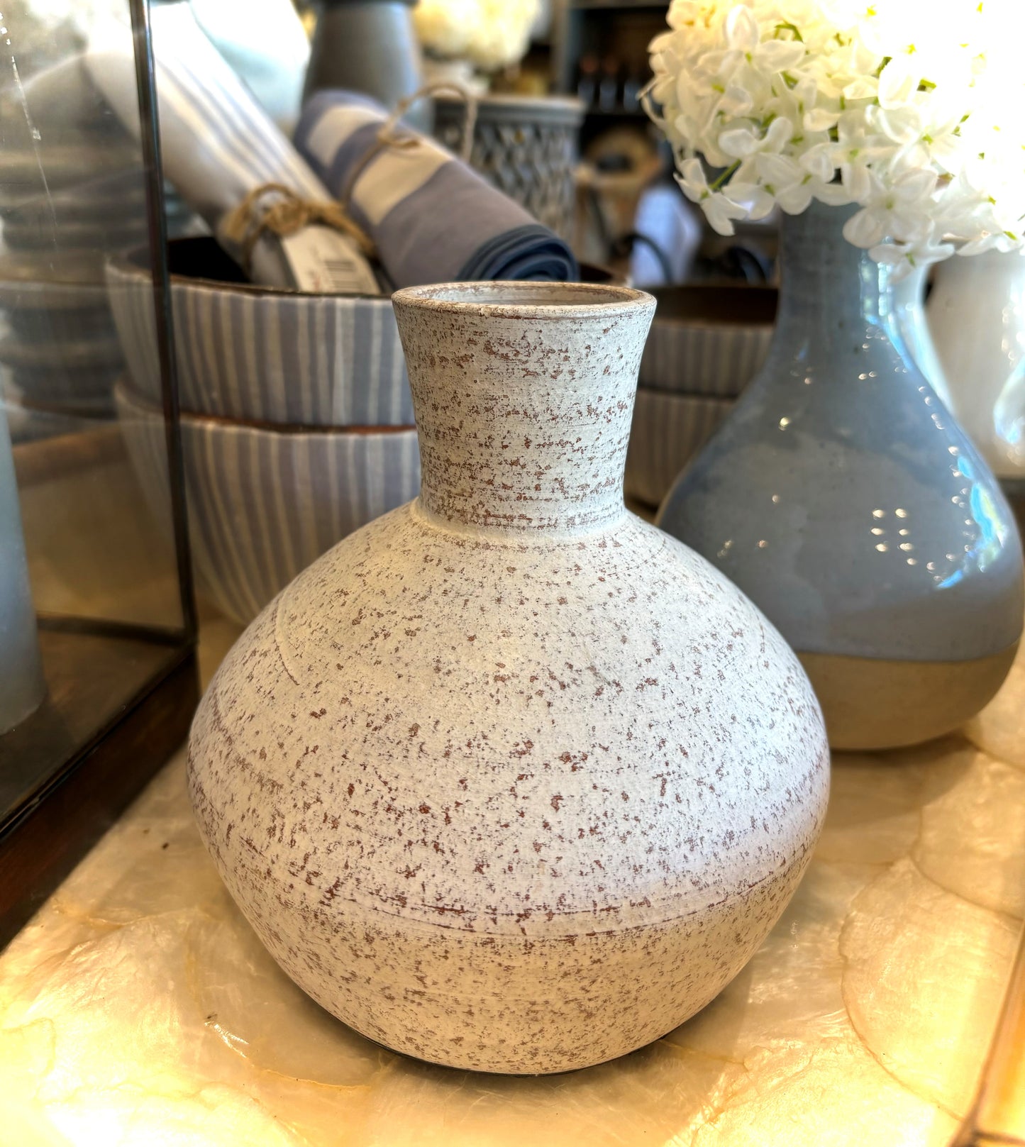 The beautiful Rocco Rustic Terracotta Vase vase with neutral white tones makes it perfect for the bedroom, to place on a bedside table or as part of the living room decor.