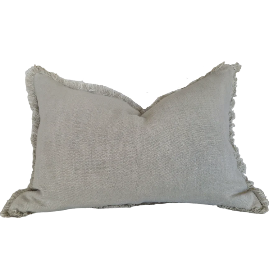 Indulge in the luxurious comfort and elegant style of the Natural Stone Fringed Lumbar Cushion. Made with exquisite heavyweight French linen, this cushion adds sophistication and warmth to any home décor. With its timeless design and subtle colour hue, it is sure to create an inviting and tasteful atmosphere in your space.