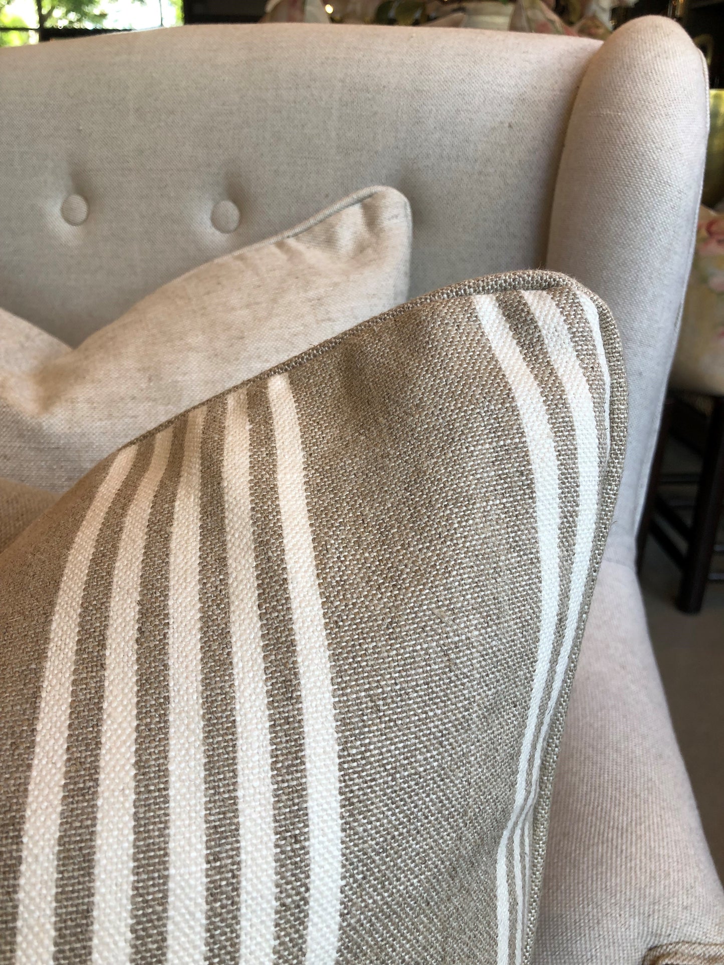 Indulgently fashioned from a luxurious, durable fabric, this exquisite Wortley White Stripe Beige Cushion boasts classic white stripes on a warm neutral background. It's the perfect timeless and graceful accent to elevate any home decor. Includes a luxurious feather insert.