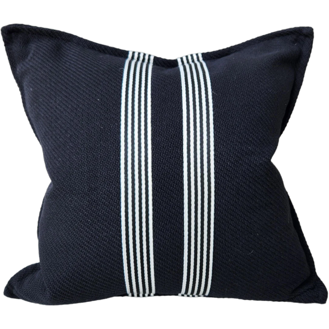 Channeling the sleek elegance of Milano's fashion district, each Black & White Herringbone Striped Cushion features the striking contrast of black and white, evoking the timeless beauty of the marble found in both ancient Italian villas and modern Milanese ateliers.