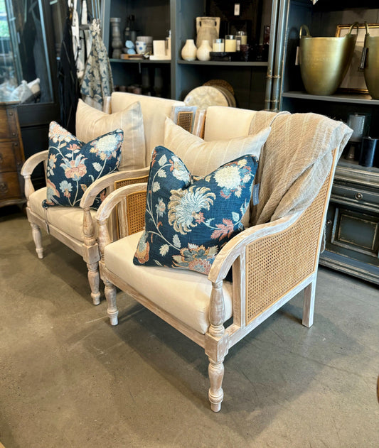 Crafted from teak and rattan, this very attractive and desireable elegant armchair with period features boasts a delicate distressed finish that lends it the patina of age. Front