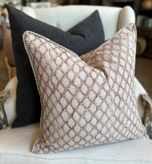 Elevate your home decor with the Cypress Block Printed Linen Rose Cushion from CHAMOIS, a beloved Swedish brand known for their impeccable style. This stunning 100% linen cushion, meticulously hand block printed on luxurious linen, boasts delicately piped edges for an elegant touch. Inspired by the opulent textiles of the Orient, this pattern will infuse any living space with a sophisticated allure.