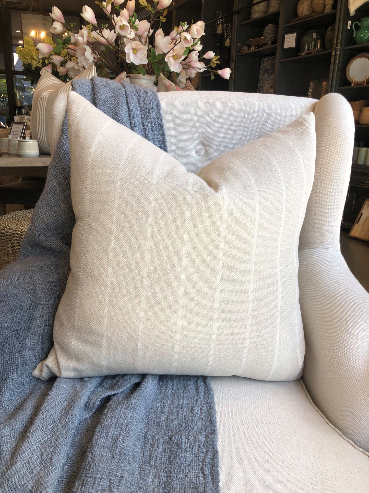 Experience the inviting warmth and rustic charm of your home with the Stéphane Striped Linen Cushion. This beautifully crafted cushion combines 60% linen and 40% cotton fabric, adorned with a simplified traditional pattern, and includes a discreet hidden zipper. Indulge in the perfect fusion of comfort and style.