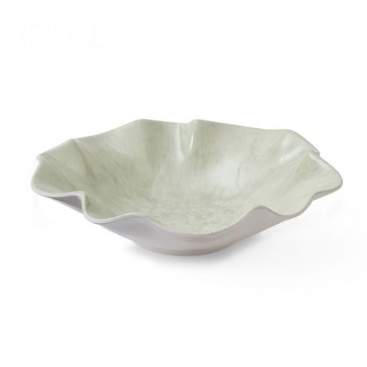 Green melamine bowl with wavy edge on a white background