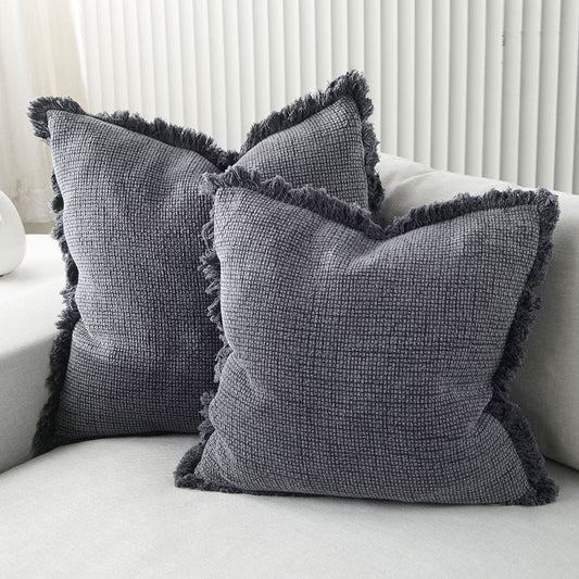 The Adele Cotton Cushion features a plush 100% cotton weave and hand frayed edging. The addition of a unique sulphur-wash finish adds a touch of sophistication to this dark grey slate design. And, for ultimate comfort, indulge in the exclusive plump feather insert included with your purchase. 60cm x 60cm.