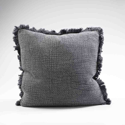 The Adele Cotton Cushion features a plush 100% cotton weave and hand frayed edging. The addition of a unique sulphur-wash finish adds a touch of sophistication to this dark grey slate design. And, for ultimate comfort, indulge in the exclusive plump feather insert included with your purchase. 60cm x 60cm. Front.