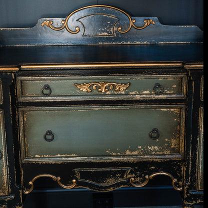 Gifted artisans in Java have crafted this one-of-a-kind furniture piece that boasts a lightly-distressed, aged look. Meticulously carved from mahogany, this exquisite item is certain to be a cherished family heirloom. It features 2 doors and 4 drawers. Front