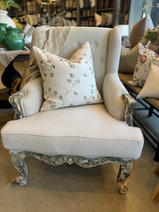 Indulge in the exquisite texture of the meticulously made Amalie Ivory Botanical Cushion. This cushion boasts a stunning yet subtle blue and green floral pattern on a neutral backdrop, and includes a plush feather insert for unparalleled coziness. The back is enhanced with an oatmeal finish in a duck egg blue colour.