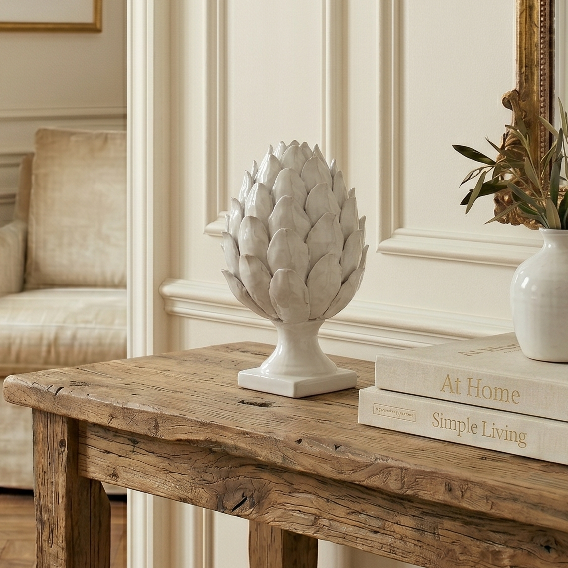 Living room with wooden console table, decorative items, and a window view.
