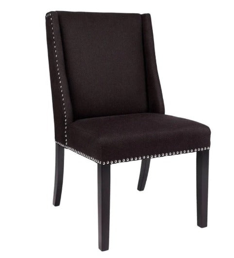 Introduce French-style sophistication to your dining space with the Louis Dining Chair. Boasting soft curves and tailored buttoning, its dark toned wood leg adds elegant formality while its black upholstery adds a contemporary touch. Front