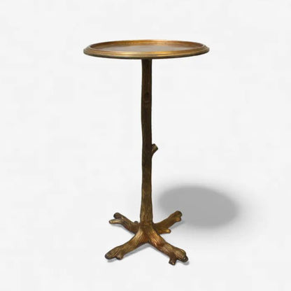 Bronze Side table with tree branch base on a white background