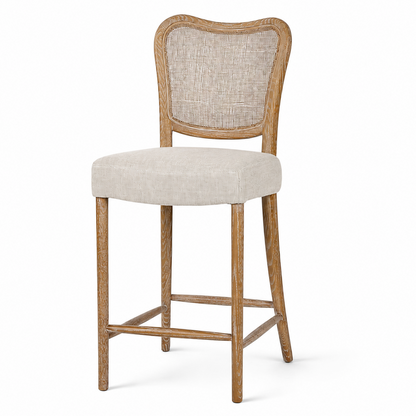 A counter-height bar stool with a light beige textured fabric seat and backrest, supported by a rustic light brown wooden frame and legs, shown against a plain white background.