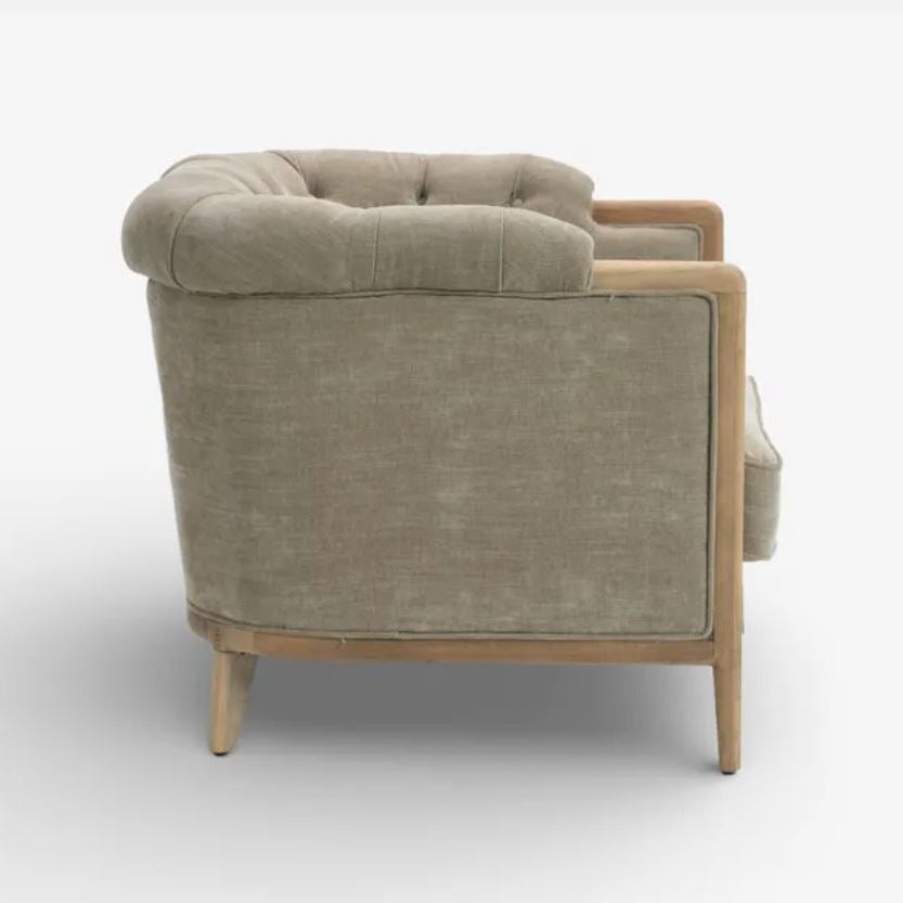 Gray armchair with wooden frame on a white background